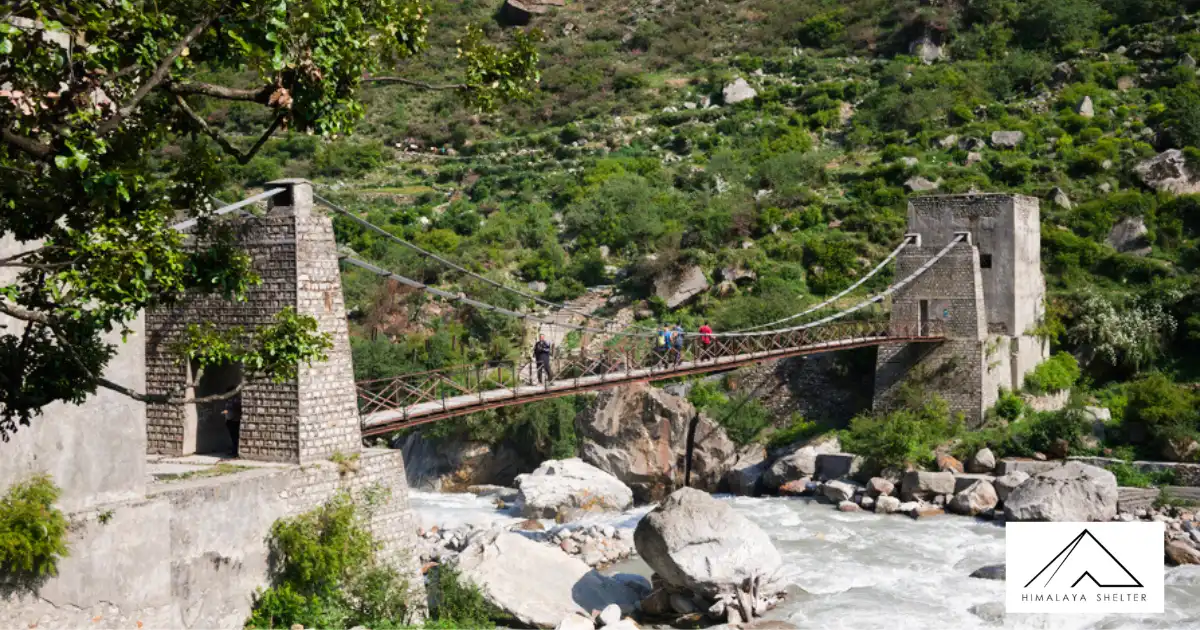 Trekkers Crossing The Bridge