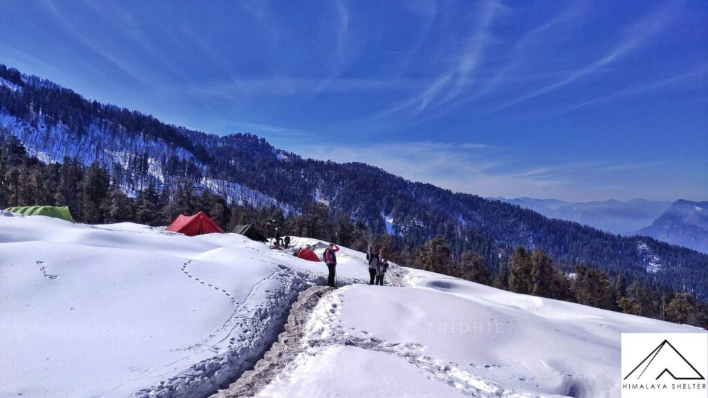 trail of Kedarkantha with snow covered landscape