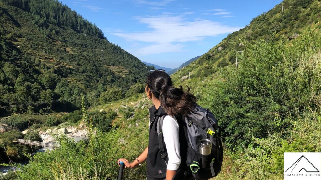 a trekkers enjoying spritual vibes on har ki dun trek